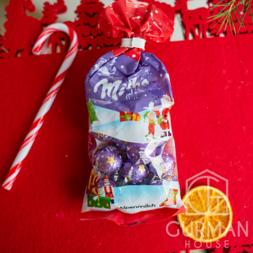 Подарунковий Чобіток із солодощами Milka 197 г