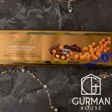 Чорний шоколад Lindt Gold з цільними лісовими горіхами 300 г