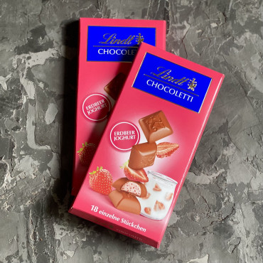 Молочний шоколад із вершково-полуничною начинкою Lindt 100 г